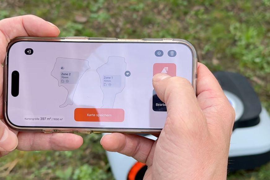 Navimow App Screenshot der GeoSketch-Funktion während der automatischen Gartenkartierung des Segway Navimow i2 LiDAR. Die App erstellt eine fotorealistische Karte in Echtzeit.